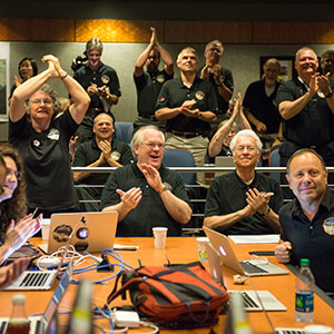 Part of the New Horizons team celebrating the spacecraft's flyby of Pluto.