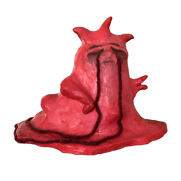 clay sculpture of sad blob-like ghost